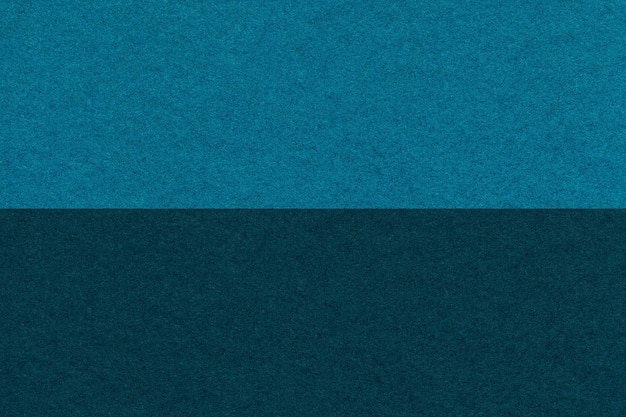Texture di carta artigianale blu navy e turchese sfondo metà due colori macro Cartone vintage ceruleo scuro
