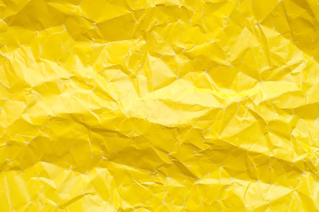 Texture di carta gialla sgualcita. Sfondo giallo