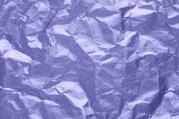 Texture di carta in colore molto peri dell'anno 2022. Sfondo viola rugoso.