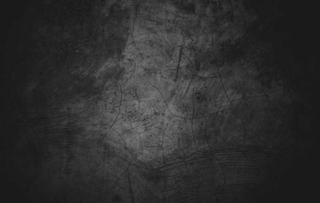 Texture di cemento in cemento nero leggermente chiaro per lo sfondo Grunge scuro afflitto da graffi Sovrapposizione di pareti scure spaventose