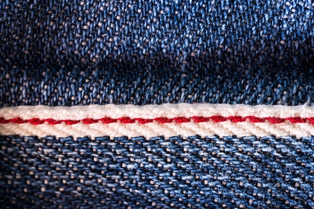 Texture di denim blu delimitato dal rosso