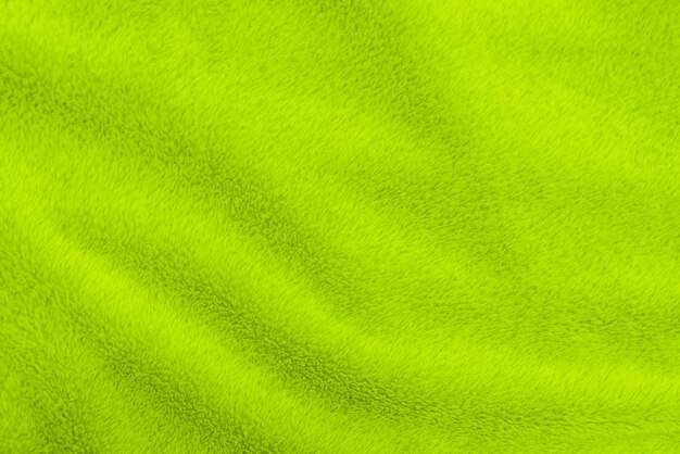 Texture di lana pulita verde lime sfondo chiaro naturale lana di pecora verde cotone senza cuciture