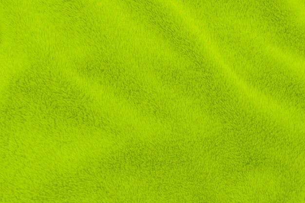 Texture di lana pulita verde lime sfondo chiaro naturale lana di pecora verde cotone senza cuciture