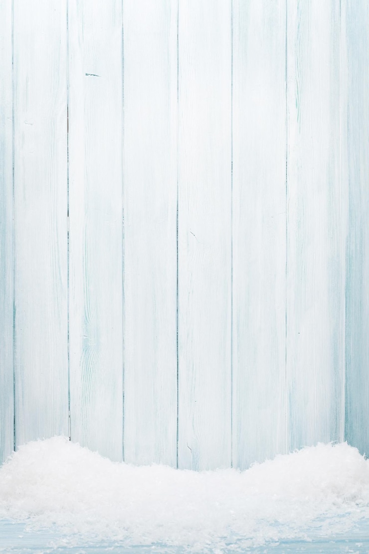 Foto texture di pareti in legno blu con sfondo natalizio di neve