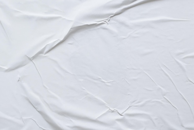 Texture di poster di carta bianca arrugginita su tela bianca