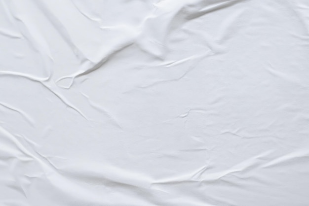 Texture di poster di carta bianca arrugginita su tela bianca
