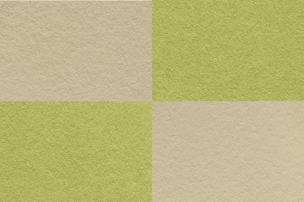 Texture di sfondo di carta beige e verde artigianale con motivo a celle Cartone d'oliva kraft vintage