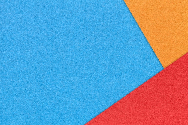 Texture di sfondo di carta di colore blu artigianale con bordo rosso e arancione Cartone turchese Modello di presentazione