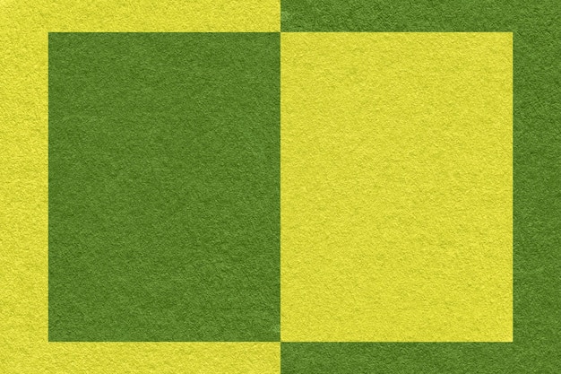 Texture di sfondo di carta verde scuro e oliva con forma geometrica e macro motivo Struttura di cartone artigianale