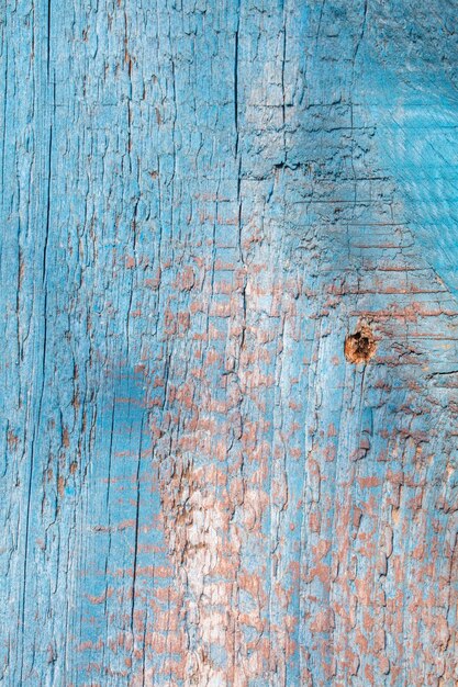 Texture di sfondo di legno vecchio con peeling vernice blu