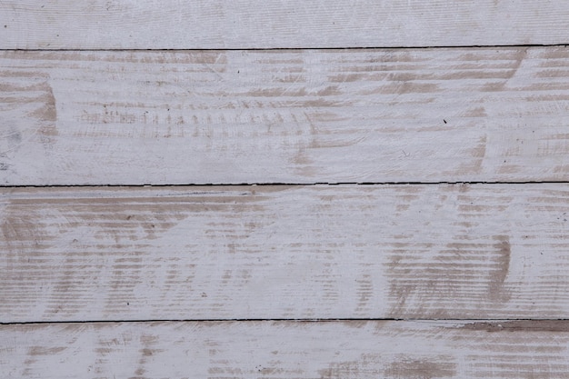 Texture di sfondo in legno bianco vintage con nodi e fori per unghie