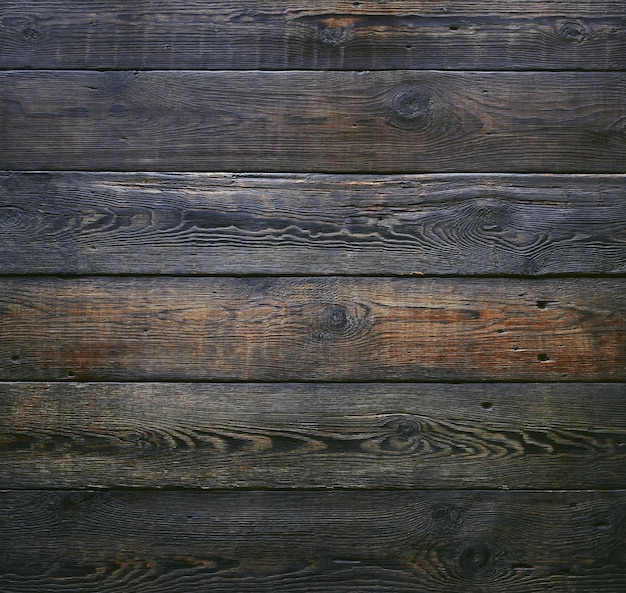 Texture di sfondo legno, legno scuro, vecchia tavola ruvida, vista dall'alto