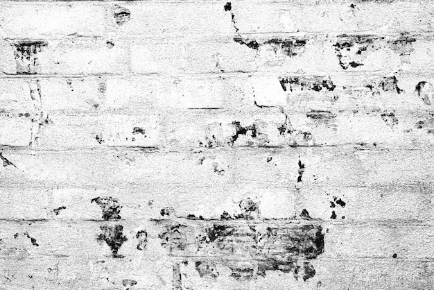 Texture di un muro di mattoni con crepe e graffi sullo sfondo