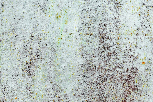 Texture di una parete metallica con crepe e graffi che può essere utilizzata come sfondo