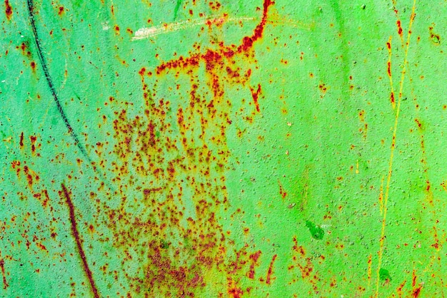 Texture di una parete metallica con crepe e graffi che può essere utilizzata come sfondo