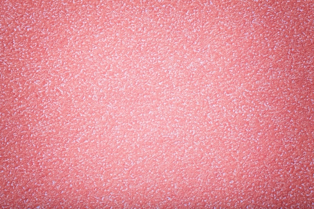 Texture di vecchio fondo di carta rosa chiaro, primo piano.