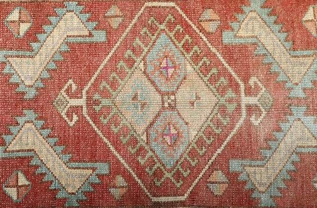 Texture e motivi a colori di tappeti tessuti