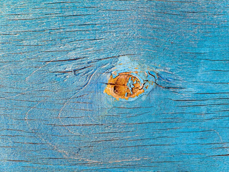 Texture sbiadita di una superficie in legno dipinta di blu
