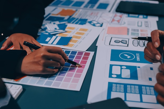 The designer team is designing the uxui system to make the uxui system work well on new phones and support system updates Website development concept UI UX front end designer