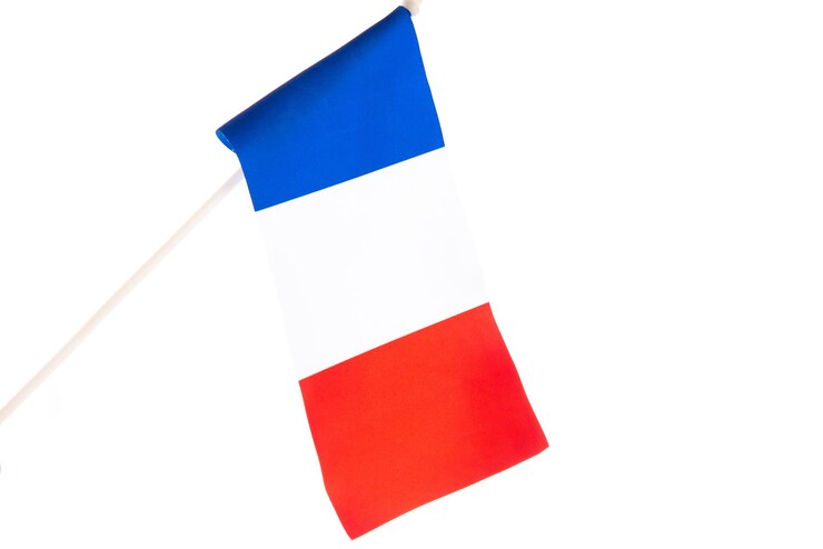The flag of france on a white background developing flying in the wind