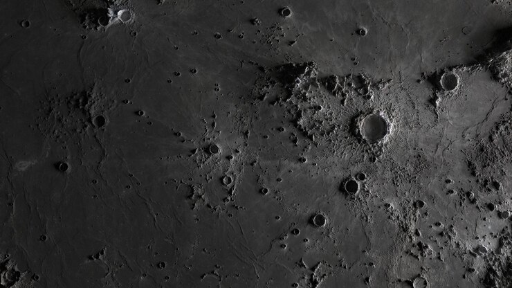 The surface of the moon in craters close-up