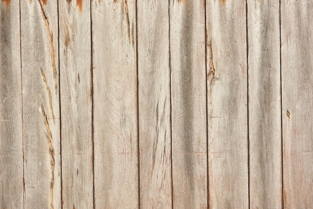 the texture of light wood planks vertical