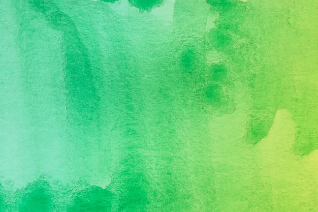 Tonalità verde del fondo astratto della pittura della mano di arte dell&#39;acquerello