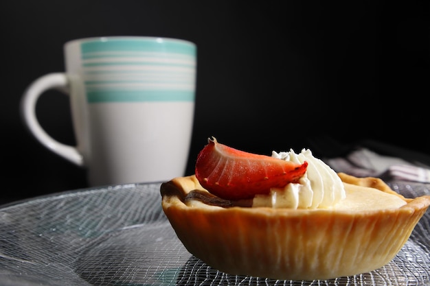 Torta al limone con una tazza di caffè