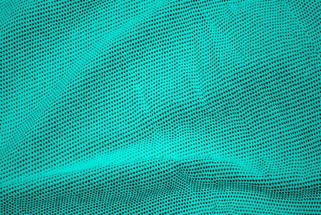 Trama del tessuto di lino di colore ciano vista ravvicinata con onde per lo sfondo