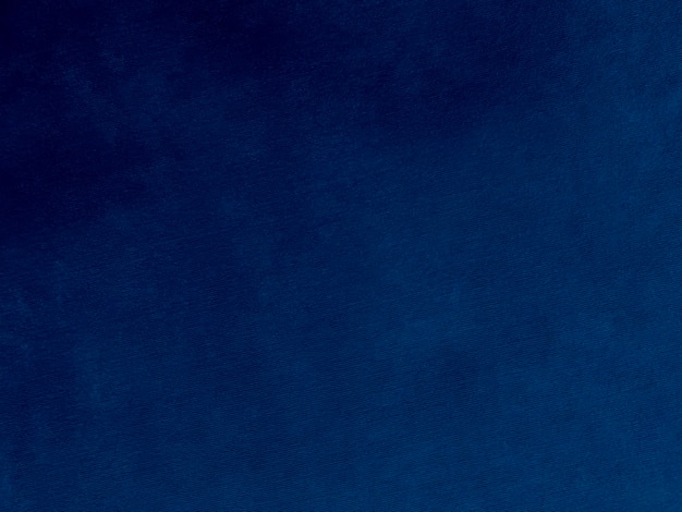 Trama del tessuto di velluto blu scuro utilizzato come sfondo Tessuto panne color cielo sfondo di materiale tessile morbido e liscio tono di cobalto di lusso in velluto schiacciato per la seta