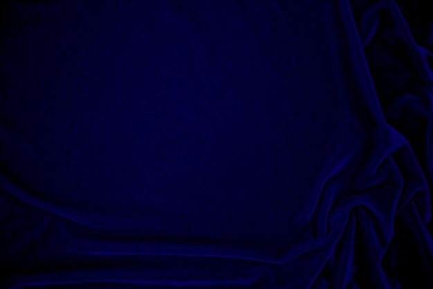 Trama del tessuto di velluto bule scuro utilizzato come sfondo Tessuto panne color cielo sfondo di materiale tessile morbido e liscio tono di cobalto di lusso in velluto schiacciato per la seta