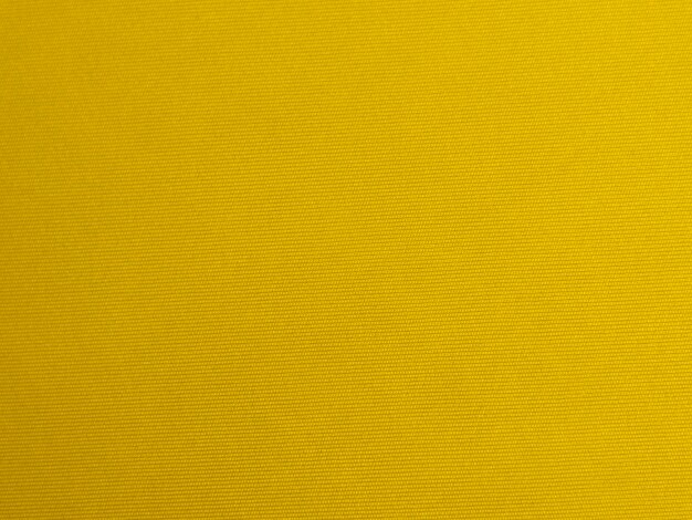 Trama del tessuto di velluto giallo utilizzato come sfondo Vuoto tessuto giallo sfondo di materiale tessile morbido e liscio C'è spazio per textxD