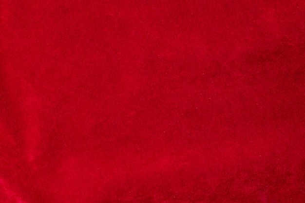 Trama del tessuto di velluto rosso utilizzato come sfondo sfondo di tessuto rosso di materiale tessile morbido e liscio C'è spazio per textx9