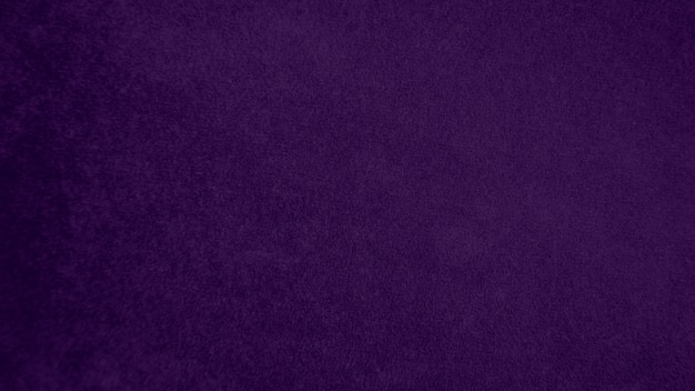 Trama del tessuto di velluto viola scuro utilizzata come sfondo Tono di colore sfondo di stoffa viola di materiale tessile morbido e liscio C'è spazio per il testo e per tutti i tipi di lavoro di progettazionexD