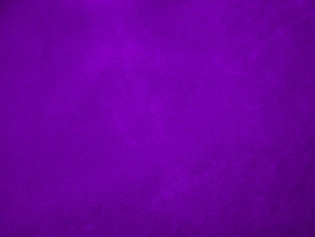 Trama del tessuto di velluto viola utilizzato come sfondo Tessuto panne di colore viola sfondo di materiale tessile morbido e liscio velluto schiacciato tono magenta di lusso per la seta