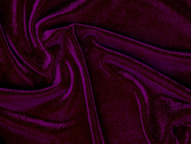 Trama del tessuto di velluto viola utilizzato come sfondo Vuoto tessuto viola sfondo di materiale tessile morbido e liscio C'è spazio per textxA
