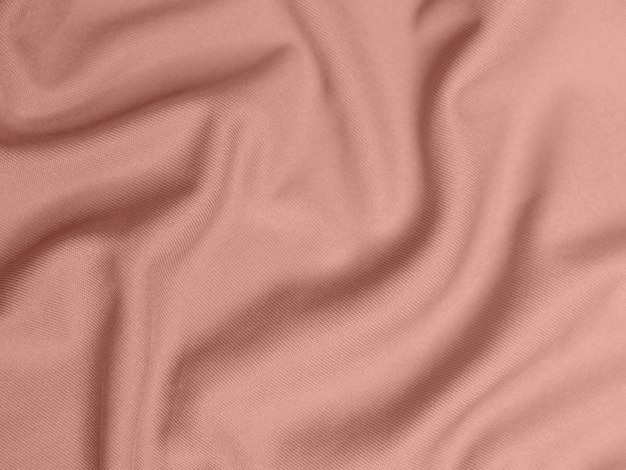 Trama del tessuto in velluto color oro rosa utilizzato come sfondo Vuoto tessuto oro rosa sfondo di materiale tessile morbido e liscio C'è spazio per il testo