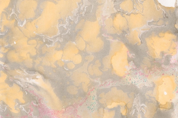Trama di inchiostro in marmo colorato su sfondo di carta da acquerello
