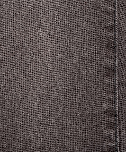 Trama di jeans in denim. Texture di sfondo denim per il design. Tessuto denim di tela. Denim blu che può