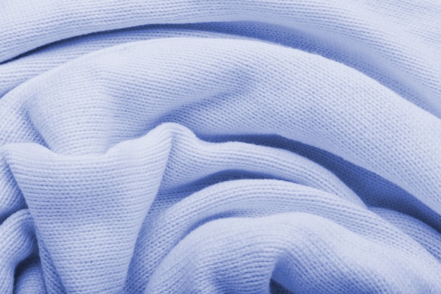 Trama di lana tessuto a maglia blu classico per lo sfondo. Close up blu materiale a maglia pattern per il design.