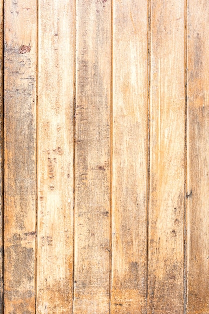 Trama di listelli di legno disposti verticalmente con vernice invecchiata