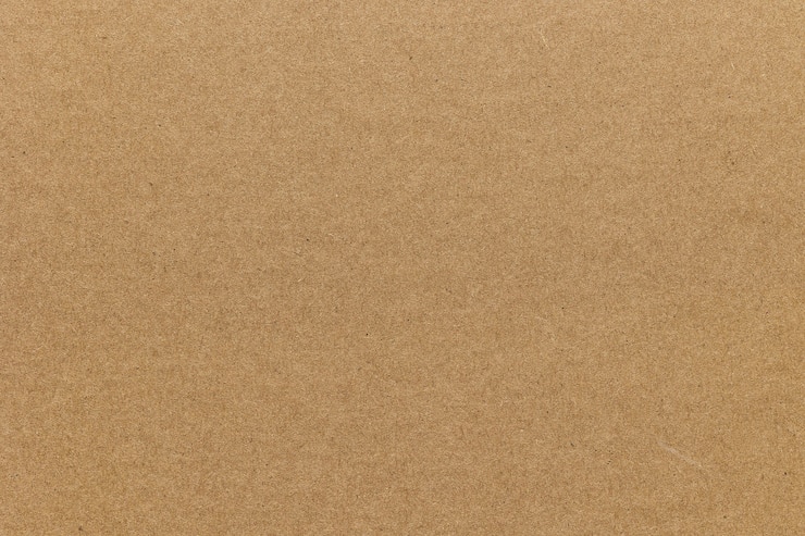 Foto trama di sfondo di carta cartone marrone