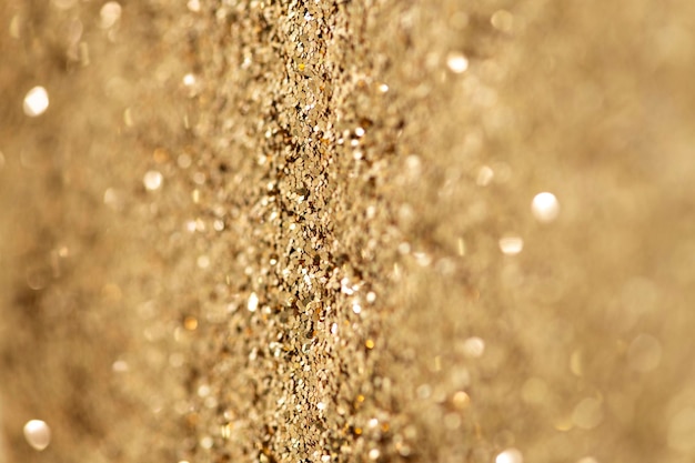 Trama di sfondo glitter oro scintillante
