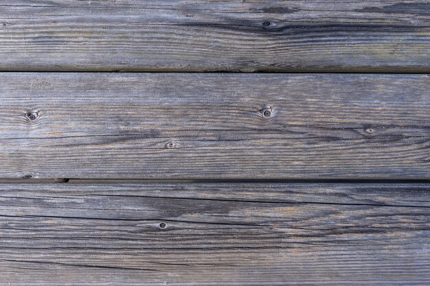 Trama di sfondo in legno scuro. Vecchi pannelli di recinzione