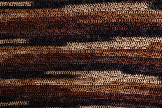 Trama di sfondo lavorata a maglia di filo di lana in quattro colori