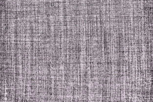 Trama di tessuto di sfondo grigio rosa un pezzo di panno di lana è ben disposto sulla trama superficiale