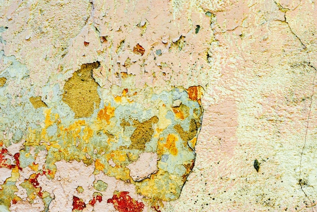 Trama di un muro di cemento con crepe e graffi che può essere utilizzato come sfondo