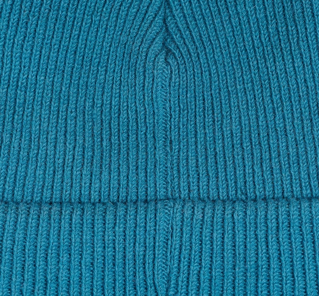 Trama di un tessuto a maglia blu Dettaglio di abbigliamento