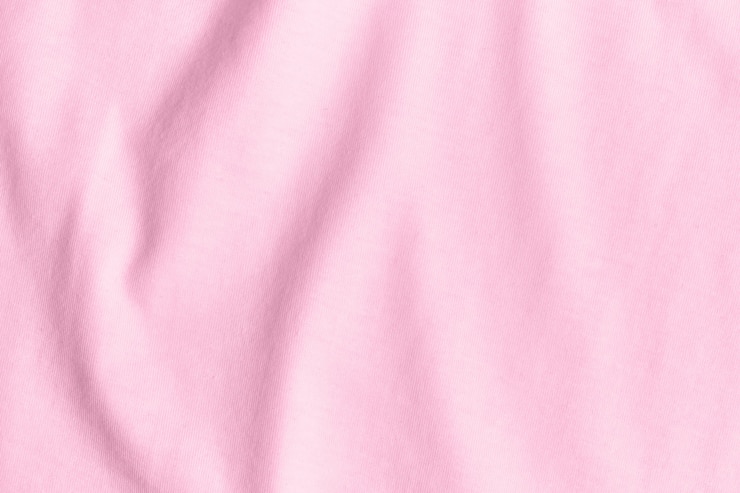 Foto trama e sfondo di tessuto rosa sgualcito.