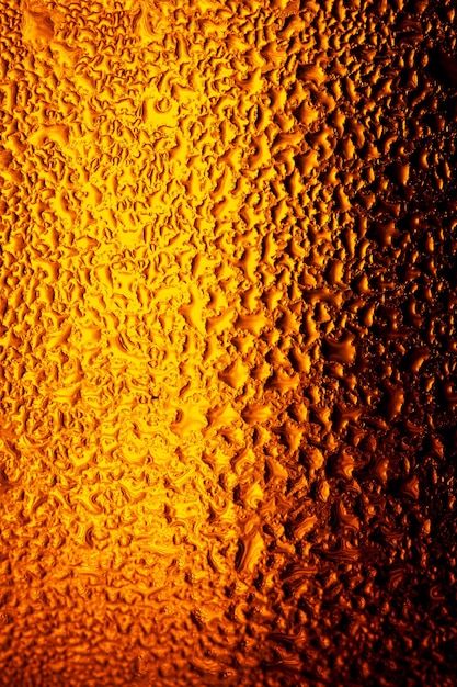 trama goccia d'acqua sul bicchiere di birra macroTexture di gocce d'acqua sulla bottiglia di birra
